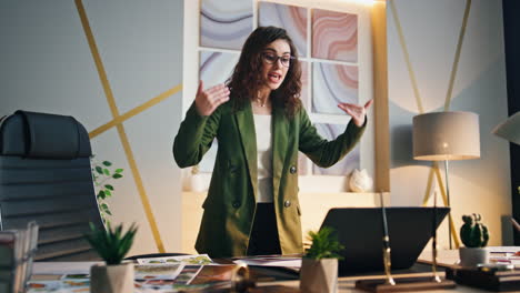 emotional businesswoman arguing video meeting standing office. lady ceo shouting