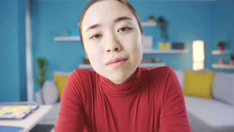 Charming-attractive-Asian-woman-looking-at-camera.