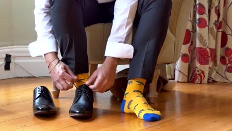 shot-of-wedding-suits,-tie,-socks,-shoes---watches-for-the-groom---groom-men