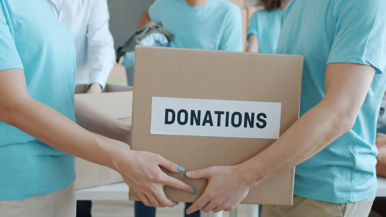 Volunteers sorting donations