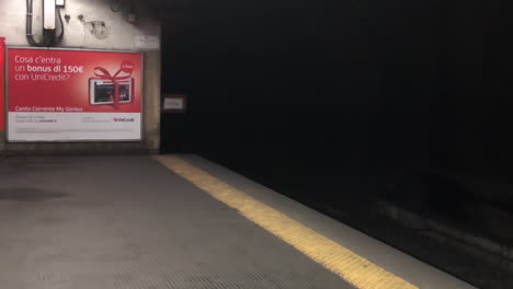 close up on dark and deserted underground metro station in capital city
