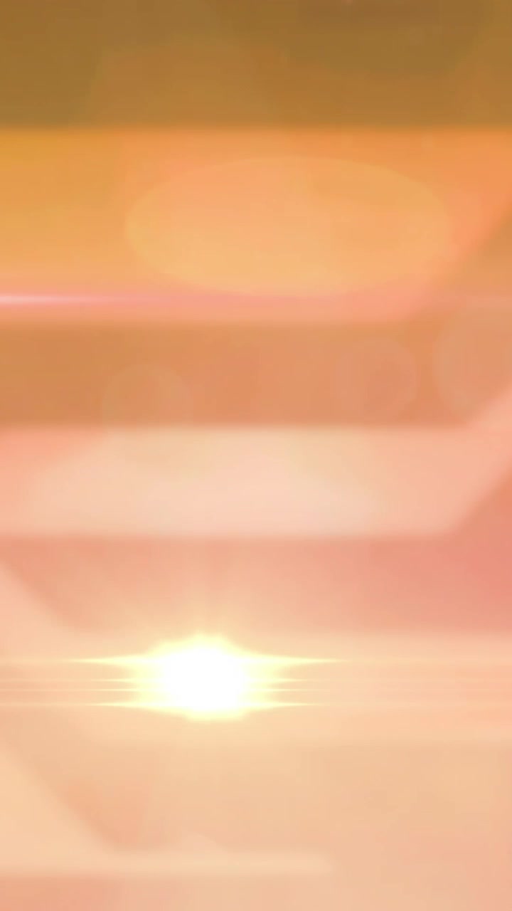 Animation of glowing spot with lens flare on orange patterned background