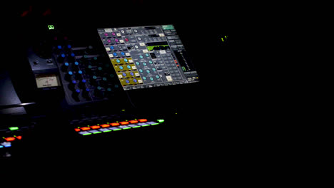 person operating sound editing table, panoramic view