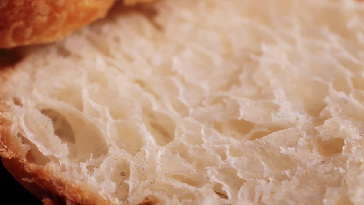 Croissant with jamon ham, Salmon, in Modern Cafe, Top View of Healthy Breakfast in Cafe. English breakfast: fried egg, bacon toast on sandwich.