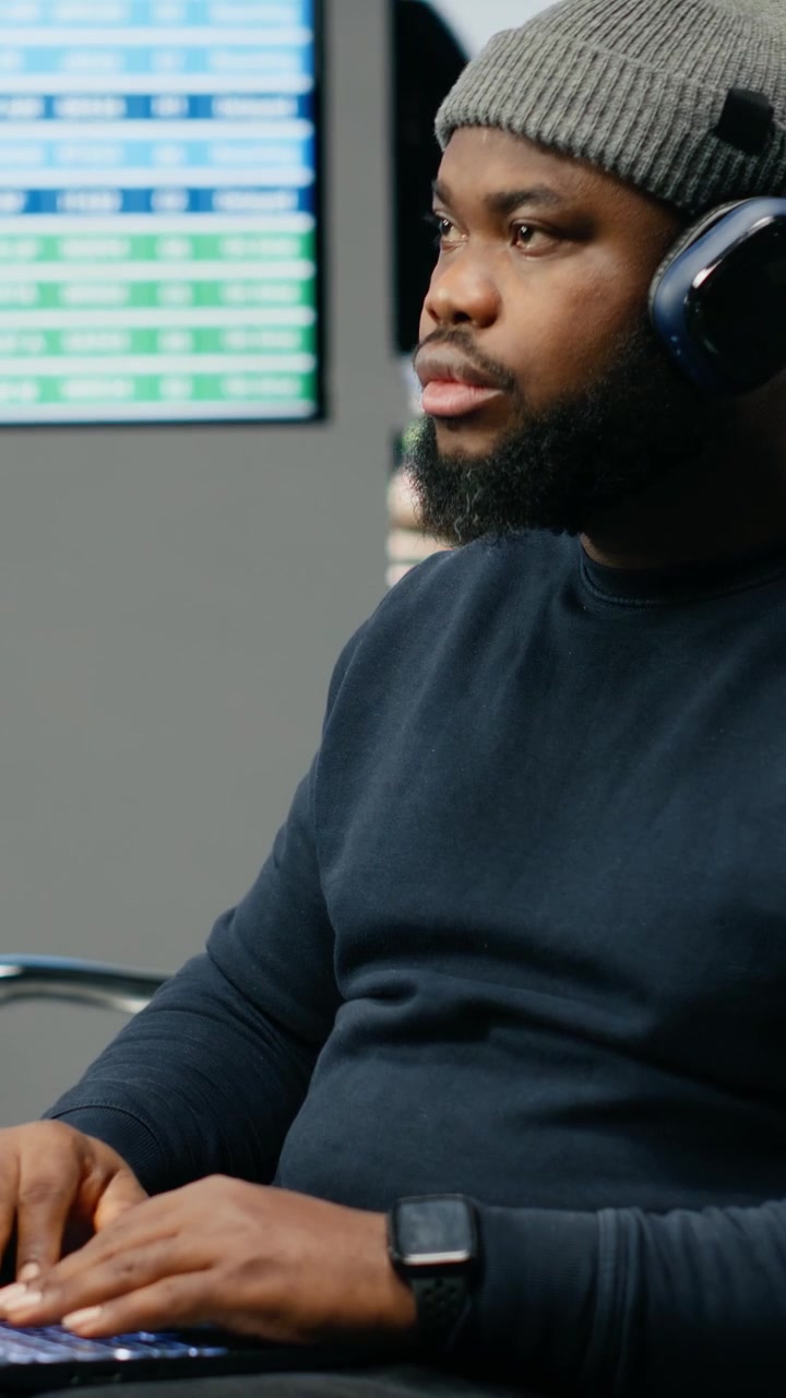 Vertical Video Business without suit, black man traveling for work, informal startup culture