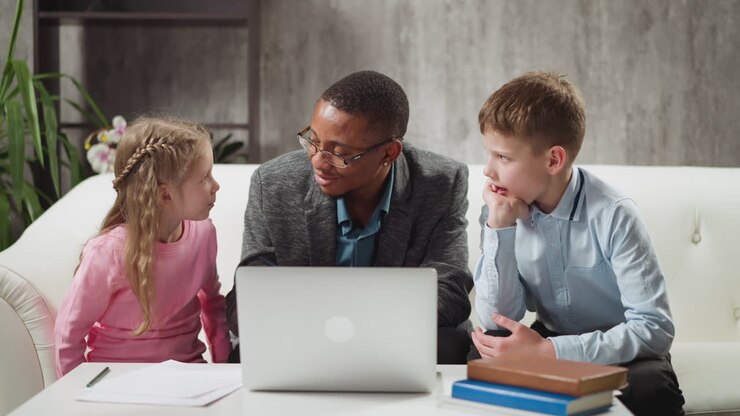 English native speaker tutor gives task to boy and girl