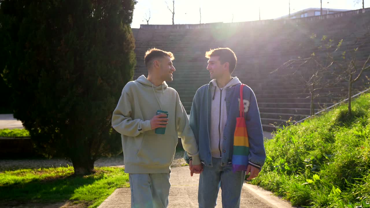 Gay Couple Holding Hands in Park