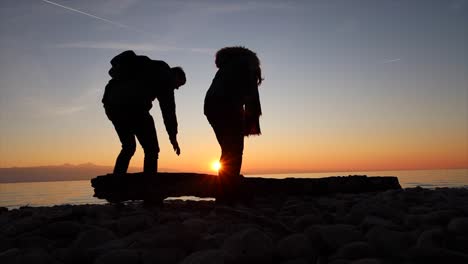 timelapse of couple watching the sunset