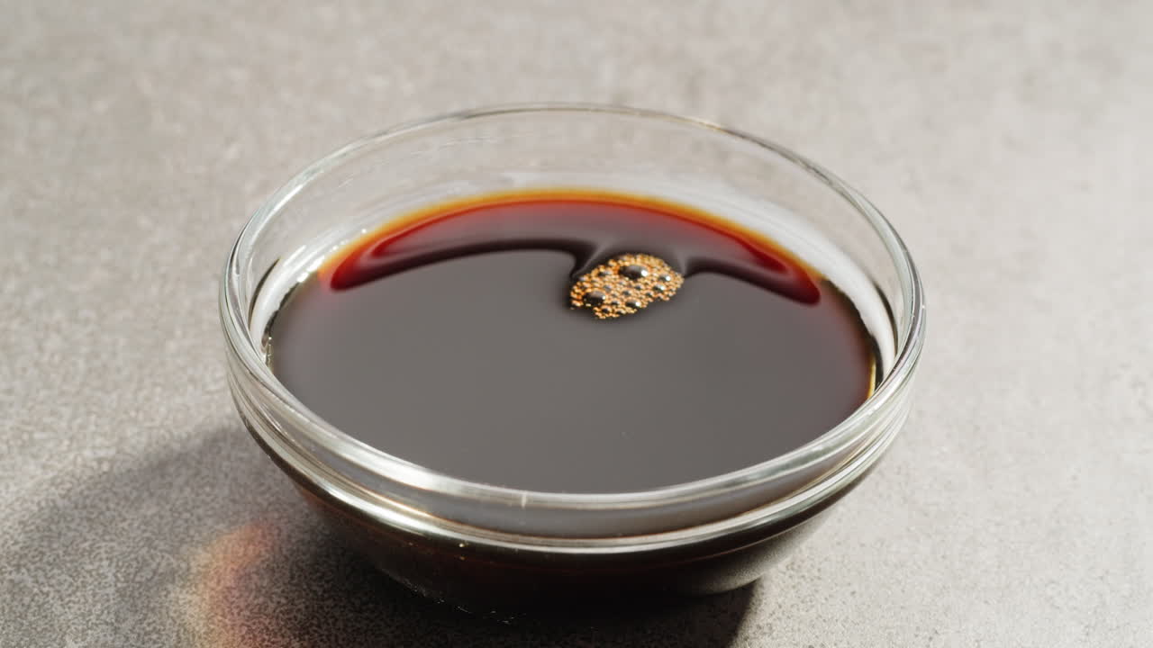 Dipping a Dumpling in Soy Sauce