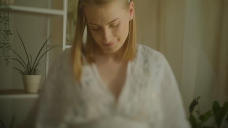pregnant woman holding beautiful bouquet