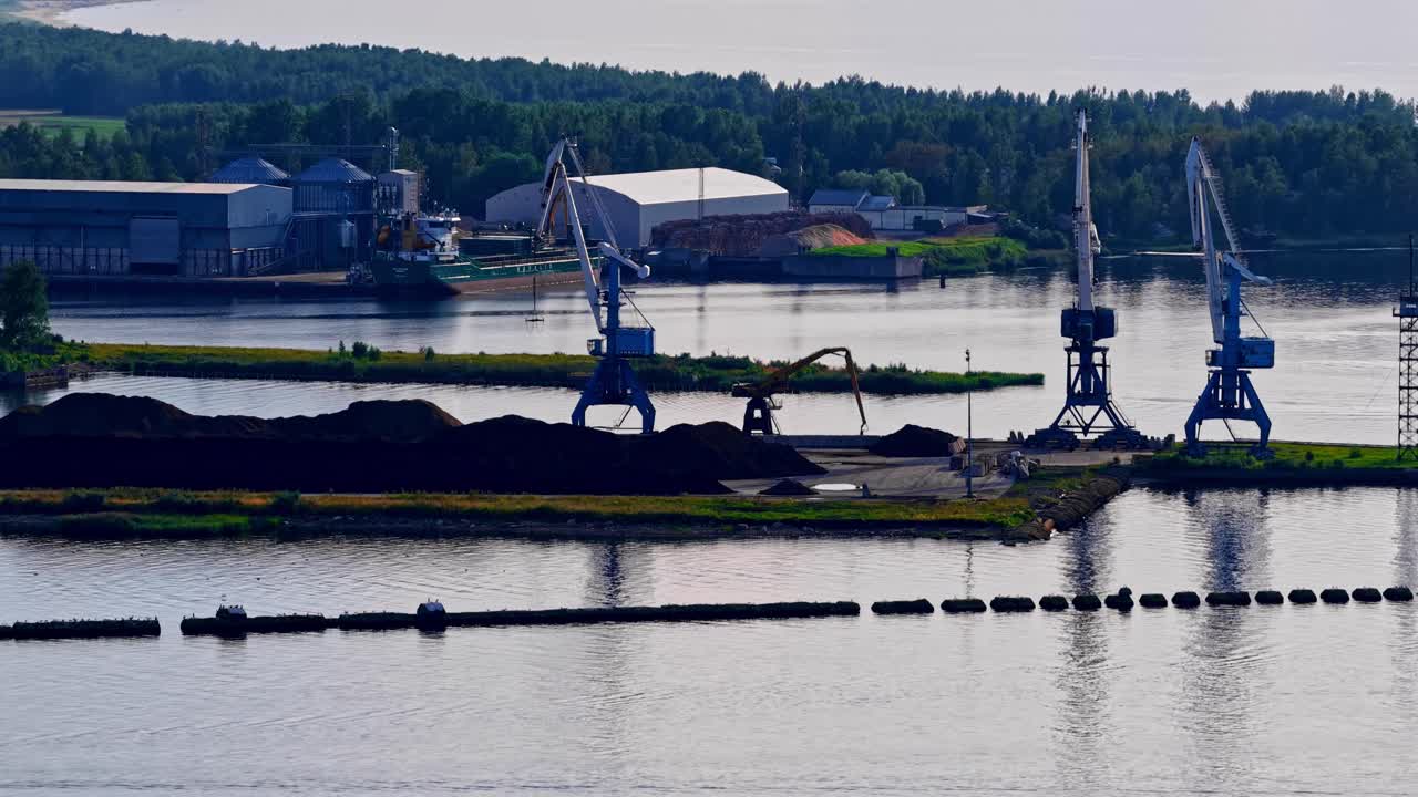 Port Industrial Baltic sea cargo boat ferry repair yard facility crane bulk material unloading