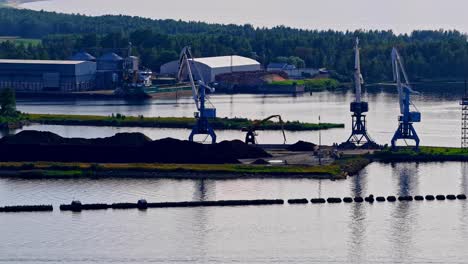 port industrial baltic sea cargo boat ferry repair yard facility crane bulk material unloading
