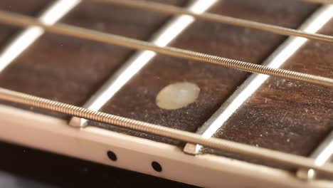 acoustic guitar strings vibrating, shot on super slow motion camera 1500 fps