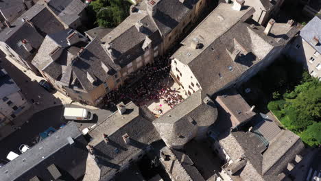 Aerial-traveling-towards-Porte-du-Therond-Marvejols-France--street-performance