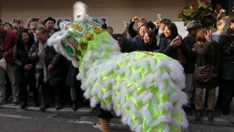february 24, 2018, tokyo, japan - a lion dance performs during the chinese new year parade 2018 in yokohama's chinatown.