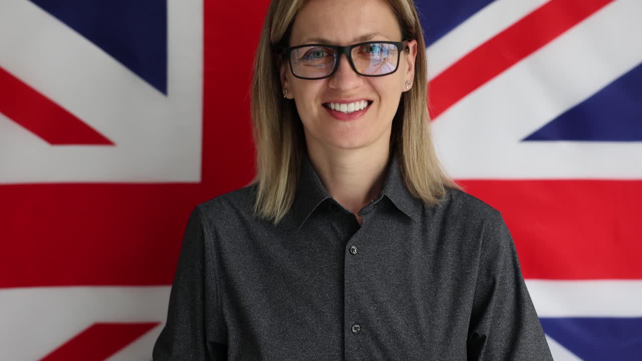 Portrait of a Woman in Front of a British Flag