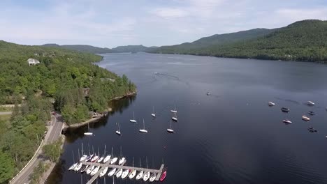 aerial shot over summer lake in tremblant