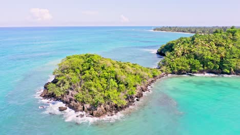 Stunning-tropical-coastline-and-azure-blue-waters-of-Caribbean,-aerial