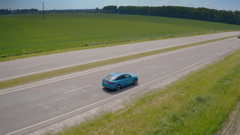 new audi on highway road. audi e-tron shows his unbelievable speed on highway road