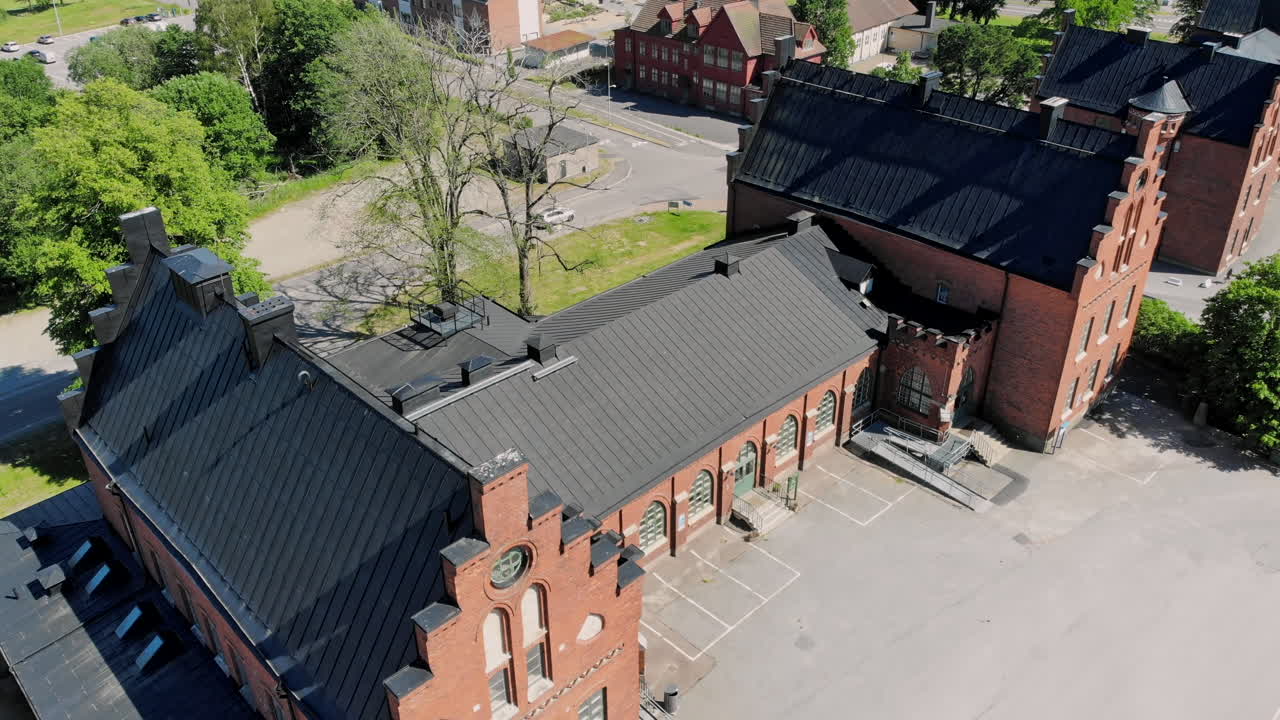 Drone flying forward above Kvibergs Military Barracks in Gothenburg, Sweden