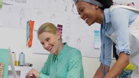 young women working in a creative office