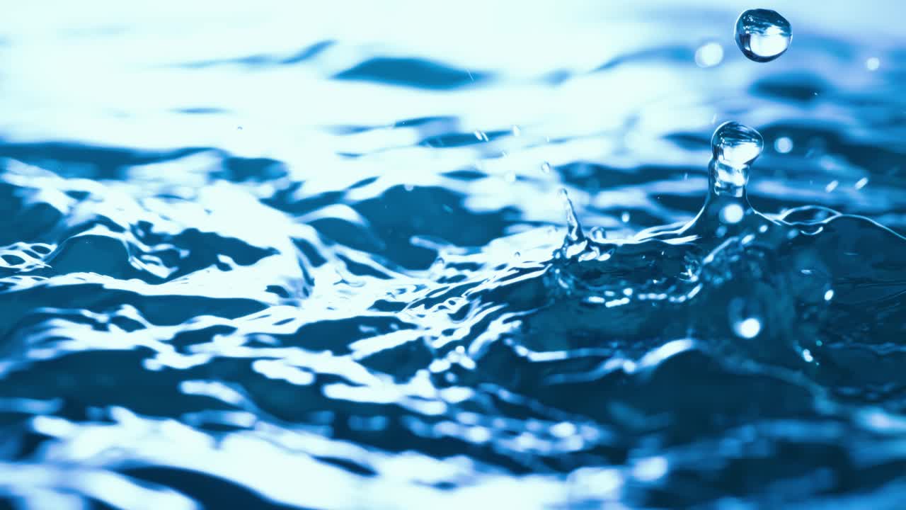 Rain water drops falling in super slow motion. Shot on super slow motion camera 1000 fps.