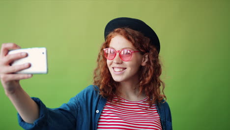 young woman taking a selfie