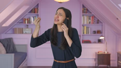 Angry-Indian-girl-shouting-on-someone-on-call