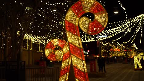 Large-lit-up-Candy-Cane-LED-Christmas-decorations-at-Landsdowne-in-Ottawa,-Canada