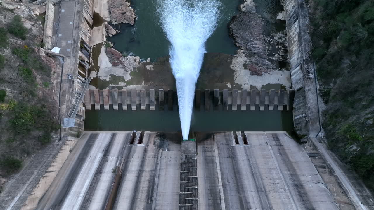 Top down aerial drone shot of Dam Spillway, drought, low water level conditions