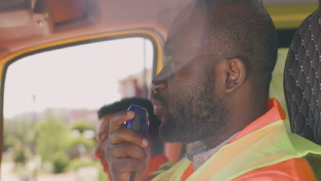 ambulance driver talking and receiving information from the hospital