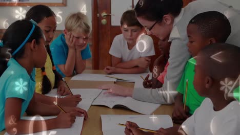 preschool teacher looking at smart child learning to write and draw