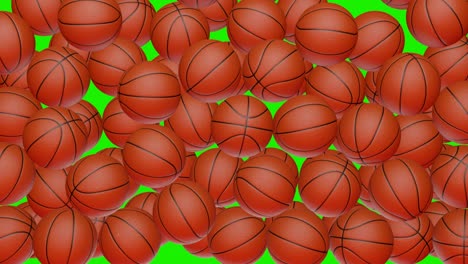 muchas bolas de baloncesto cayendo en el fondo de chromakey.