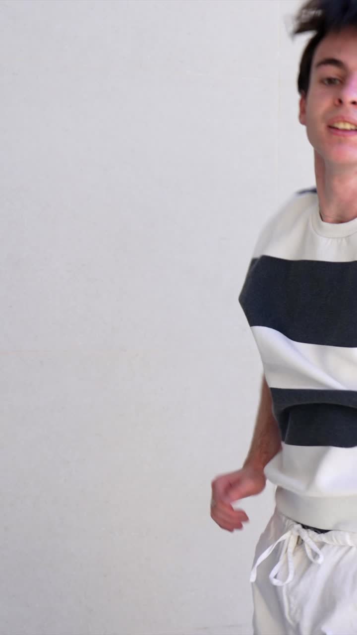 A person in a striped shirt