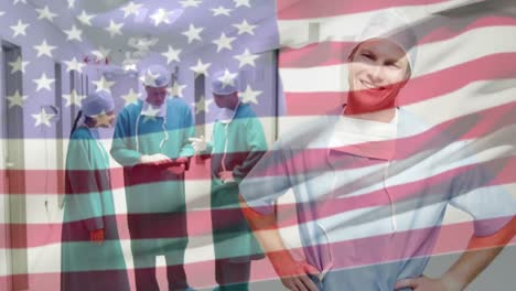 Animation-of-flag-of-usa-over-diverse-surgeons-in-hospital