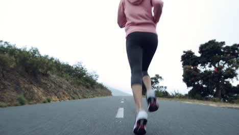 woman-running-on-road-close-up-shoes-steadicam-shot