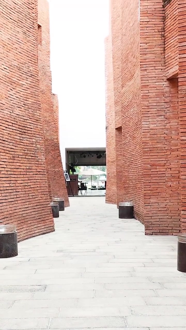 Camera circles around a brick pillar structure