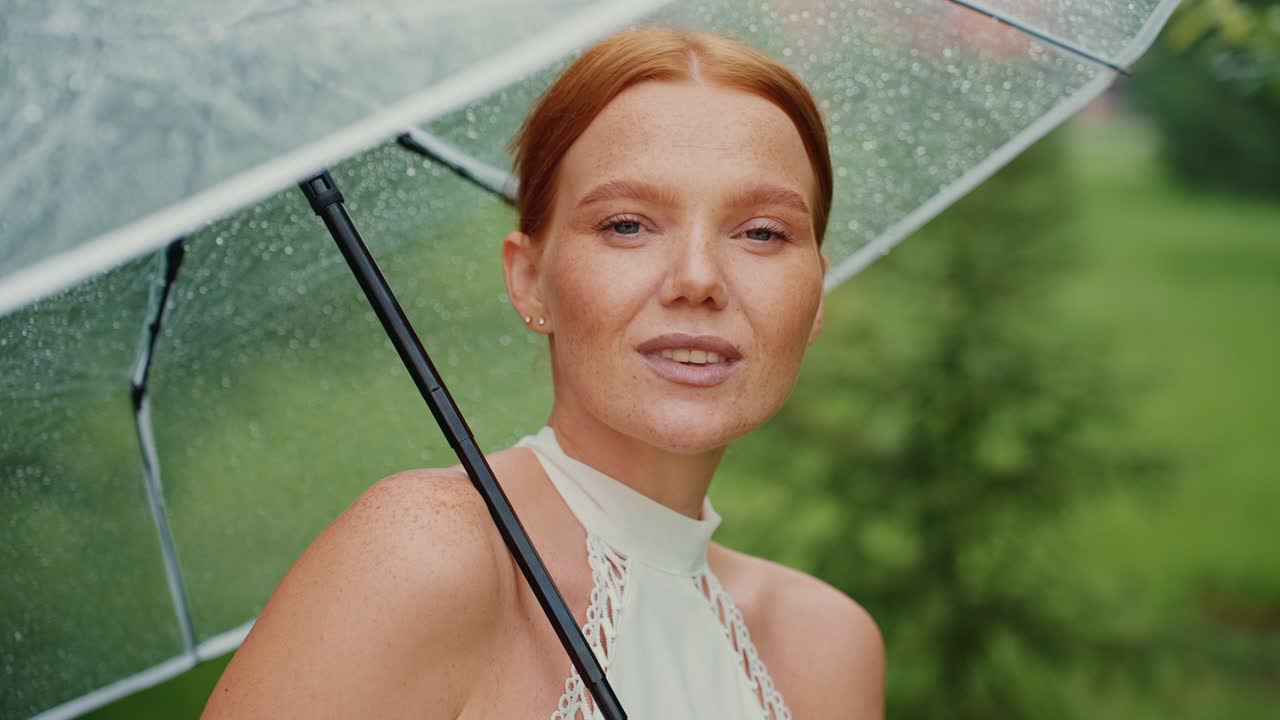 Woman Under Umbrella in the Rain