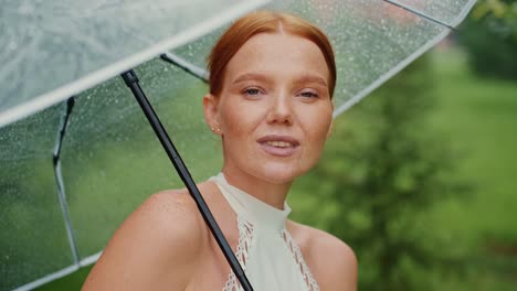 woman under umbrella in the rain