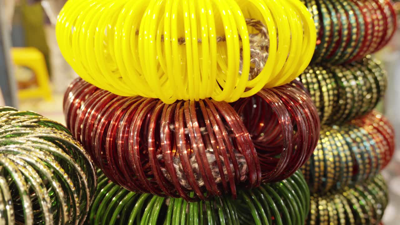 Indian woman traditional and fashionable Fancy bangles in shop