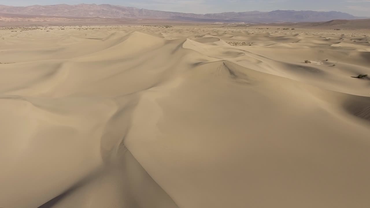 Desert sand dunes filmed with a drone