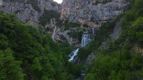 Aerial-view-of-waterfalls-near-Progonat-village,-Nivica-Canyon—a-breathtaking-natural-spectacle