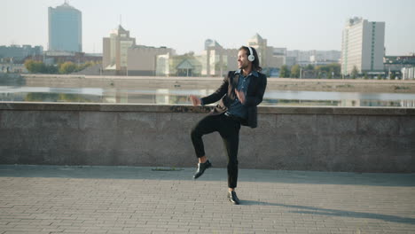 businessman dancing in the city