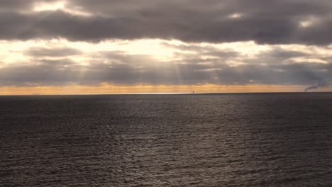 Sun-and-storm-over-Lake-Erie-near-Luna-Pier-Michigan,-USA---one-of-the-Great-Lakes