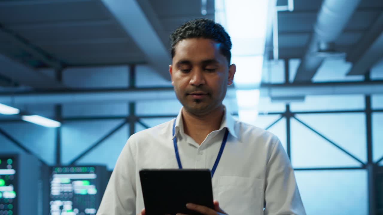 Security analyst in data center monitoring and analyzing security threats