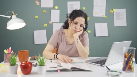 Books-and-unhappy-Female-student.