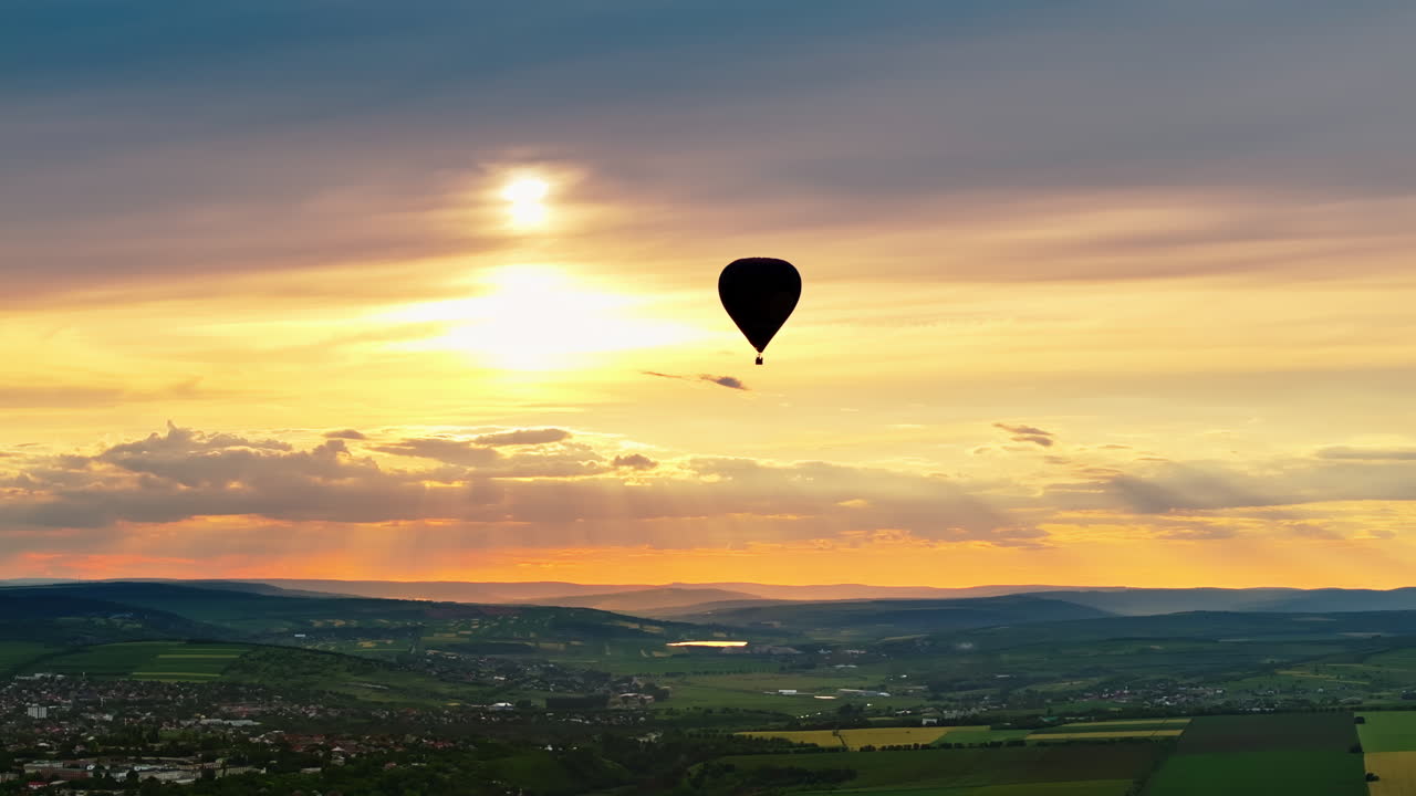 Aerial drone view of a hot air balloon flying above Chisinau, Moldova