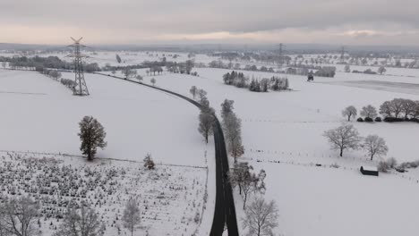 Aerial-view-of-a-snowy-road-in-northern-germany