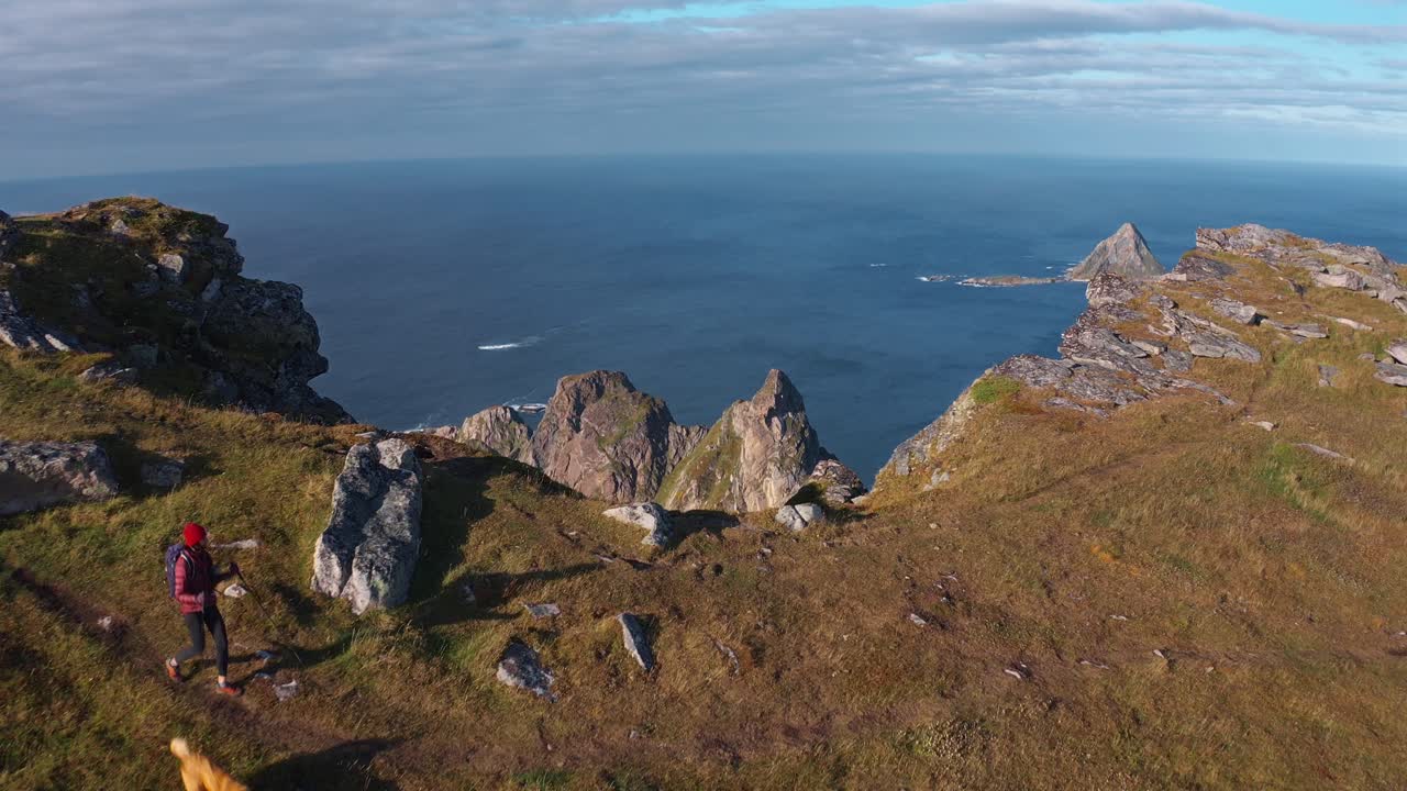 Stunning view of rugged mountain terrain overlooking a vast, calm ocean