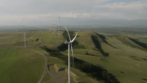 Rotating-wind-turbines-in-Gori-wind-farm-in-rural-Georgia-landscape